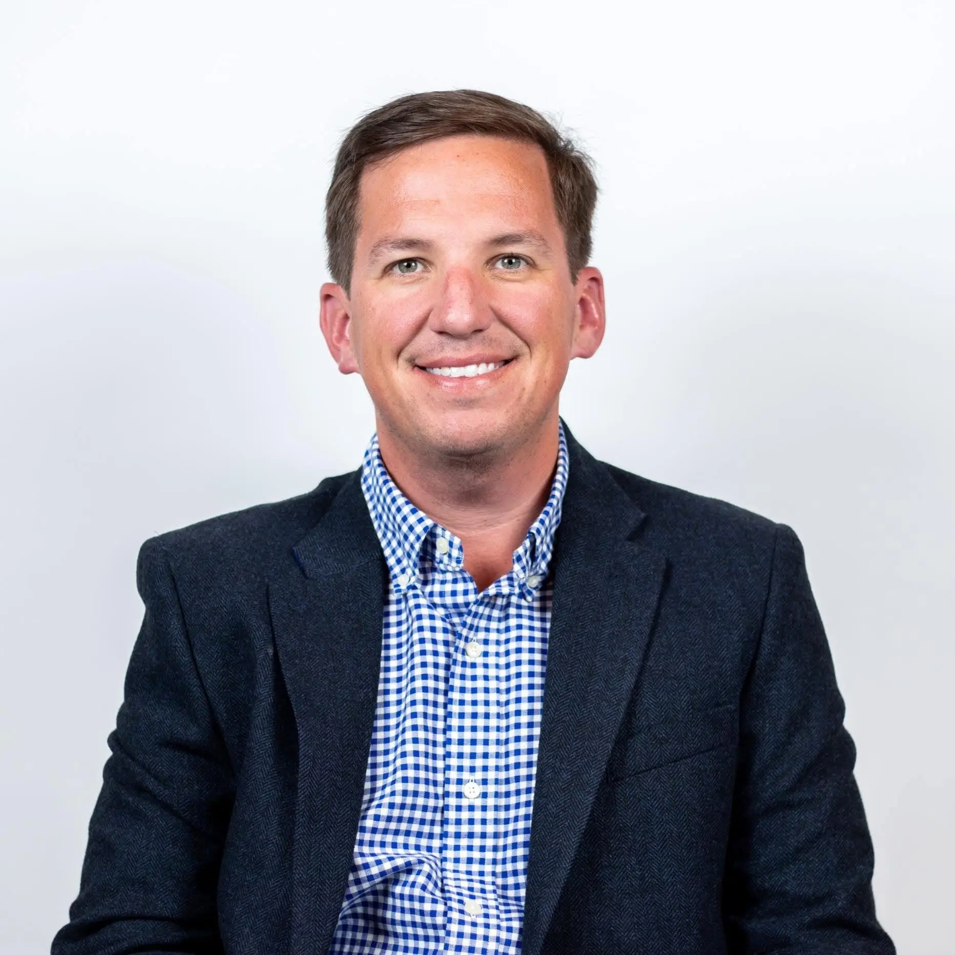 A professional head shot of Landon Headrick, board member of the CPWA.